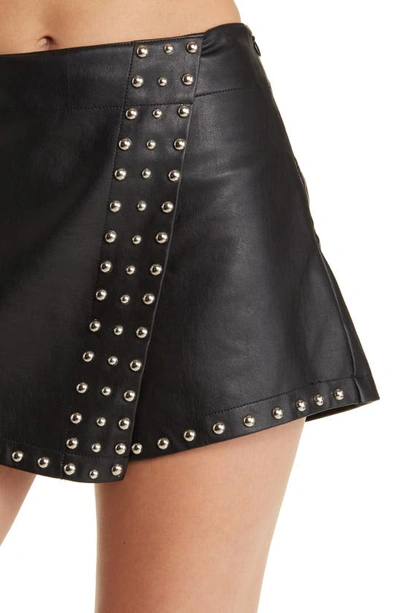Free People Emmy Studded Faux Leather Miniskort In Black