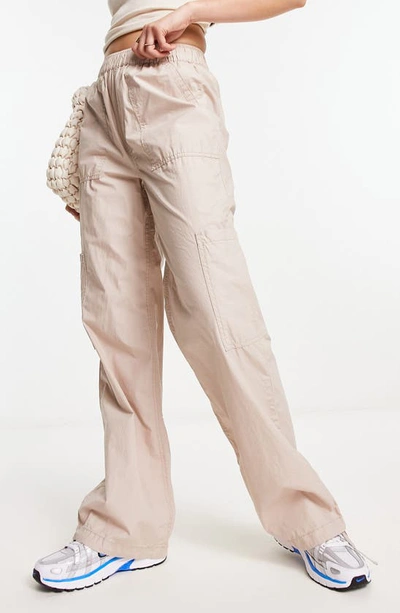Shop Asos Design Pull-on Cotton Poplin Cargo Pants In Beige