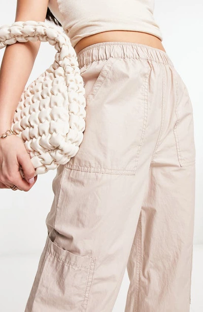 Shop Asos Design Pull-on Cotton Poplin Cargo Pants In Beige