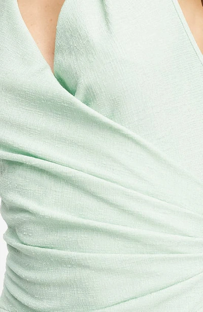 Shop Asos Design Textured Halter Neck Midi Dress In Light Green