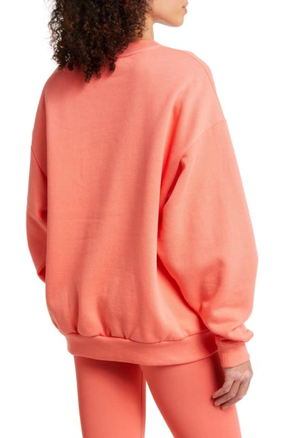 Shop Alo Yoga Accolade Crewneck Cotton Blend Sweatshirt In Candy Orange