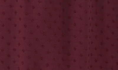 Shop Cece Clip Dot Flutter Sleeve Midi Dress In Rich Cabernet