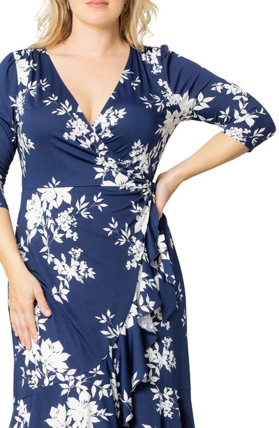 Shop Kiyonna Flirty Flounce Wrap Dress In Navy Floral Print