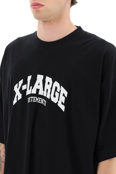 Shop Vetements Contrasting Logo Patch T-shirt In Black
