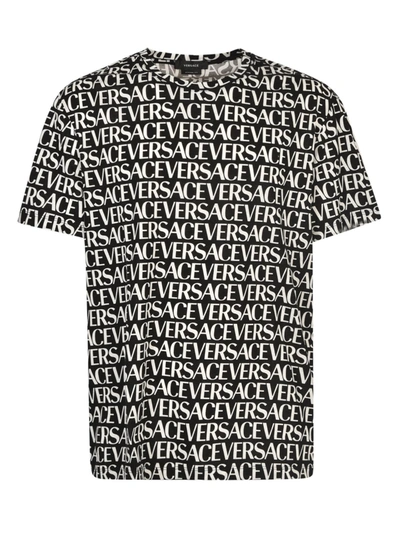 Shop Versace Logomania T-shirt In Black/white