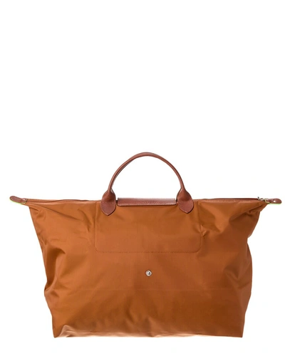 Shop Longchamp Top Handle Bag In Brown