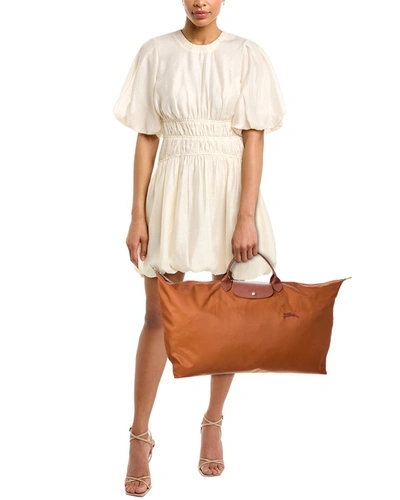 Shop Longchamp Top Handle Bag In Brown