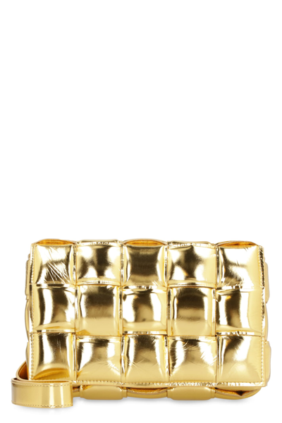 Shop Bottega Veneta Padded Cassette Crossbody Bag In Gold-gold