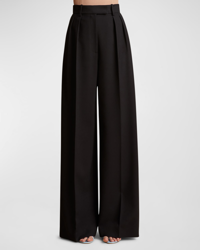 Shop Khaite Teyana Pleated Wide-leg Wool Pants In Black