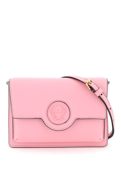 Shop Versace La Medusa Crossbody Bag In Baby Pink Baby Pink Versa (pink)