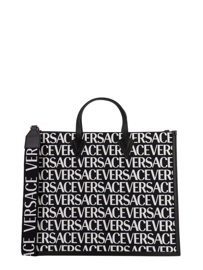 Shop Versace Logo Monogram Tote In Black/white