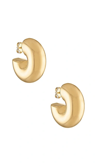 Shop Alexa Leigh Chubby Hoop Earrings In Metallic Gold