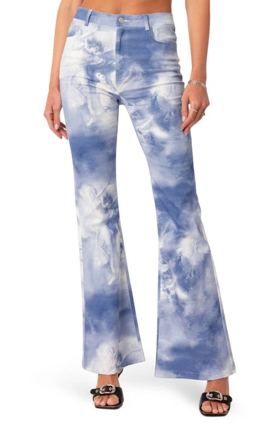 Shop Edikted Saint Printed Flare Jeans In Blue