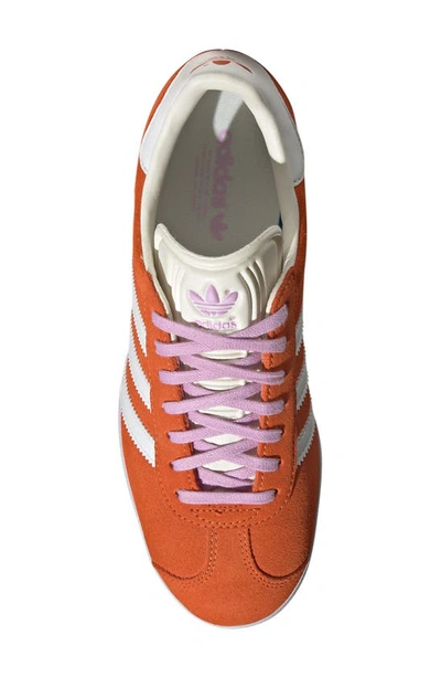 Shop Adidas Originals Gazelle Sneaker In Orange/ White/ Off White