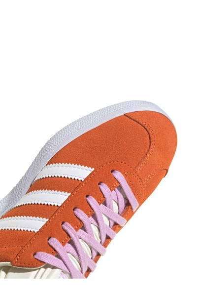 Shop Adidas Originals Gazelle Sneaker In Orange/ White/ Off White
