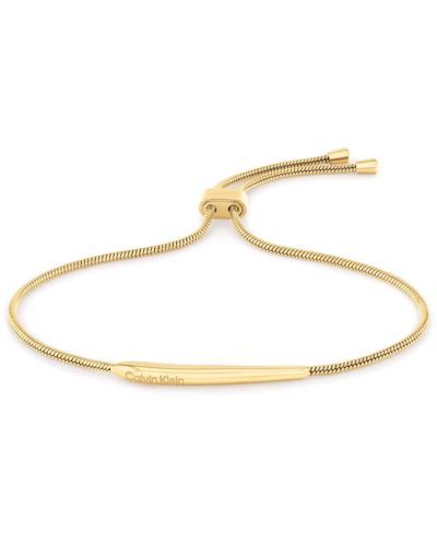 Shop Calvin Klein Linear Drop Bracelet In Gold Tone
