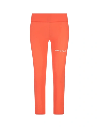 Shop Palm Angels Orange Leggings With Contrast Logo And Side Bands In Arancione