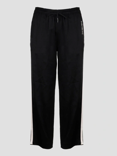 Shop Saint Laurent Crepe Satin Sweatpants In Black