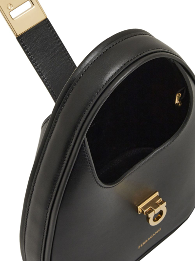 Shop Ferragamo Mini Gancini-buckle Leather Hobo Bag In Black