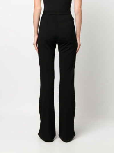 Shop Pinko High-waisted Flared Crepe Trousers In Black