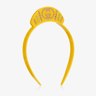 Shop Gucci Girls Yellow Interlocking G Hairband