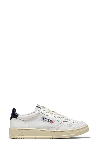 Shop Autry Medalist Low Sneaker In White/space