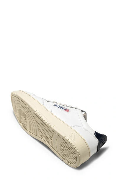 Shop Autry Medalist Low Sneaker In White/space