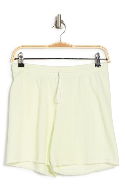 Shop Bella+canvas Cutoff Sweat Shorts In Citron