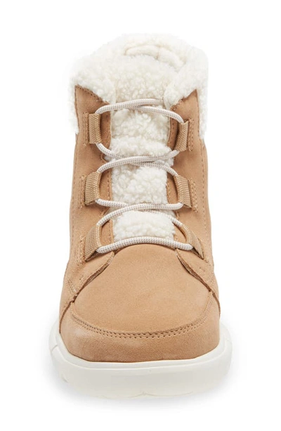 Shop Sorel Explorer™ Ii Carnival Cozy Faux Shearling Lined Waterproof Bootie In Canoe Sea Salt