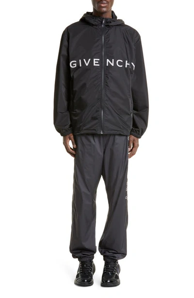 Shop Givenchy Relaxed Fit Logo Embroidered Track Pants In Black