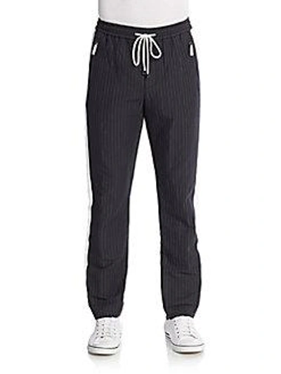 Shop Dolce & Gabbana Pinstriped Drawstring Pants In 0400088239646