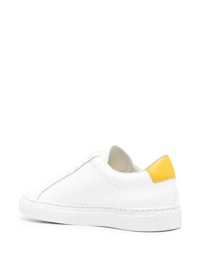 Shop Common Projects Sneakers In White Yellow