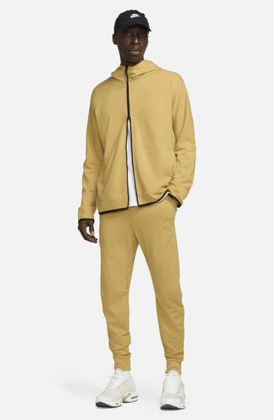 Shop Nike Tech Essentials Joggers In Wheat Gold/ Wheat Gold