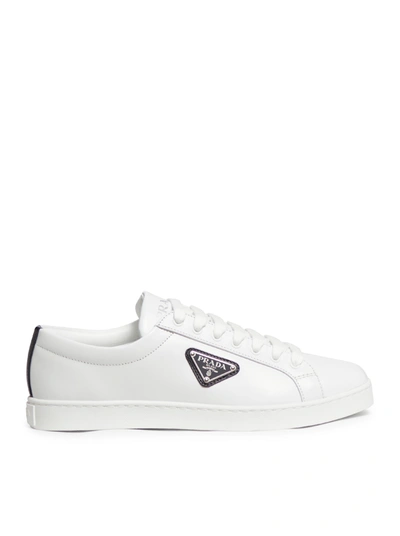 Shop Prada Brushed Leather Sneakers In White