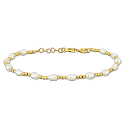 Shop Amour 3.5-5 Mm Cultured Freshwater Pearl And Bead Station Bracelet In Yellow Plated Sterling Silver