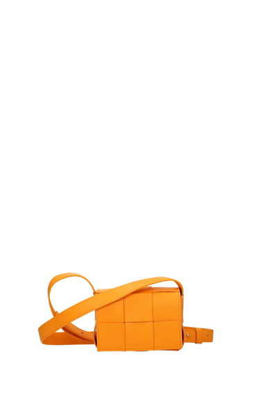 Shop Bottega Veneta Crossbody Bag Cassette Leather Orange Mandarin