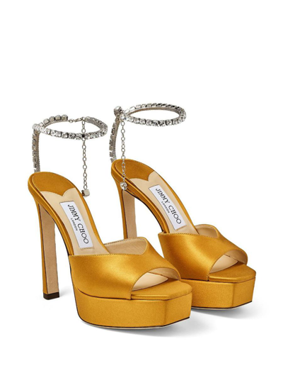 Shop Jimmy Choo Saeda Sandals With Crystal Decoration 125mm In Yellow &amp; Orange