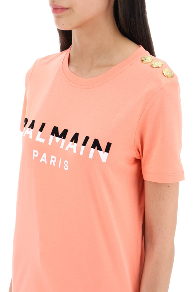 Shop Balmain T-shirt With Flocked Print And Gold-tone Buttons In Saumon Noir Blanc (pink)