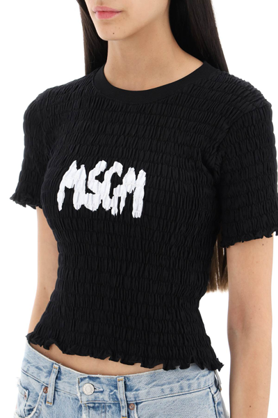 Shop Msgm Smocked T-shirt With Logo Print In Nero (black)