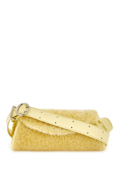 Shop Jil Sander Mini Cannolo Crossbody Bag In Lemon (yellow)