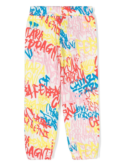 Shop Chiara Ferragni Graffiti-print Cotton Trousers In Yellow