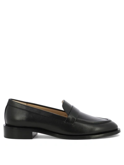 Shop Stuart Weitzman "palmer Sleek" Loafers In Black