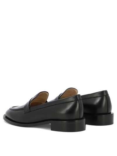Shop Stuart Weitzman "palmer Sleek" Loafers In Black