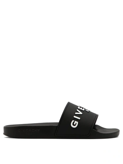 Shop Givenchy "slide" Sandals In Black