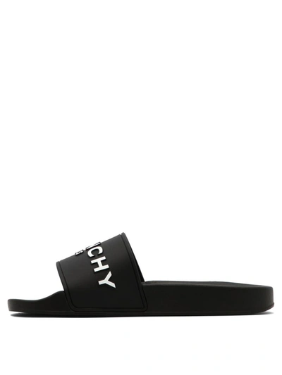 Shop Givenchy "slide" Sandals In Black