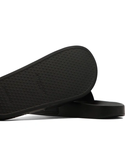 Shop Givenchy "slide" Sandals In Black