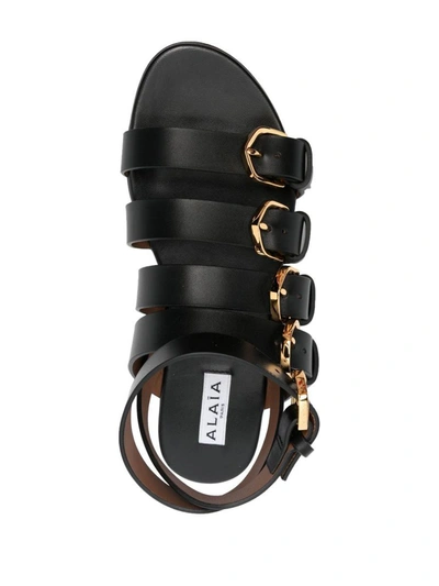 Shop Alaïa Leather Sandals In Black