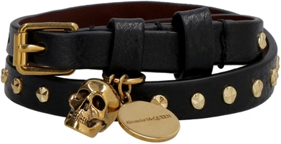 Shop Alexander Mcqueen Leather Bracelet With Metal Logo Pendant And Skull In Black