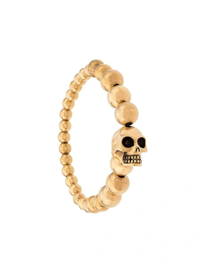 Shop Alexander Mcqueen Man's Golden Brass Skull Bracelet In Metallic