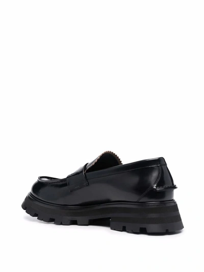 Shop Alexander Mcqueen Penny Slot Loafers In Black